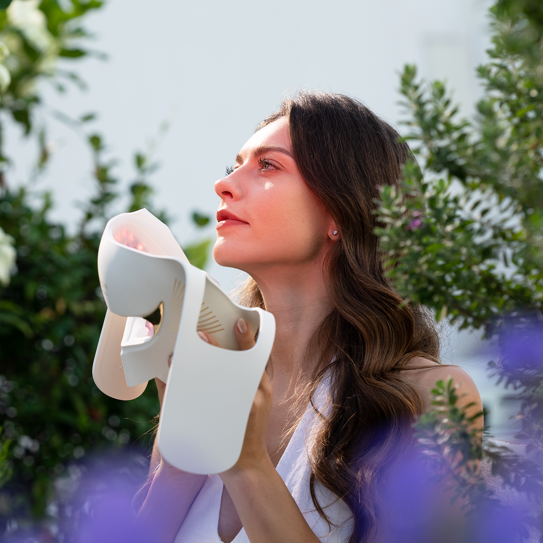 User finishing Megelin Duo-Lux light therapy, demonstrating convenient, easy-to-use facial treatment anytime, anywhere at home